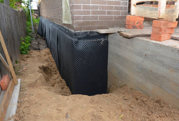 Happy homeowners after waterproofing job in Sharpsville